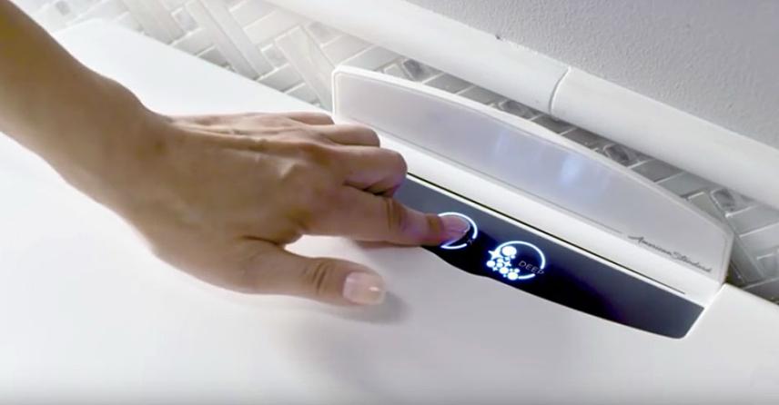 Self-cleaning toilet push button