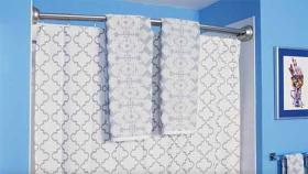https://housecallsdiy.com/uploads/projects/A-curved-shower-rod-makes-a-shower-bigger_WEB.jpg