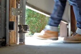 https://housecallsdiy.com/uploads/projects/Foot-Breaking-Garage-Door-Beam---Web.jpg