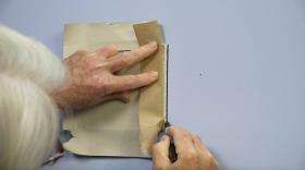https://housecallsdiy.com/uploads/projects/Man-holds-a-piece-of-cut-drywall_WEB.jpg