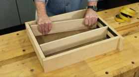 https://housecallsdiy.com/uploads/projects/Man_adjusts_wooden_drawer_divider_WEB.jpg