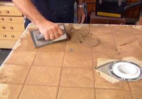 https://housecallsdiy.com/uploads/projects/Spreading-Tile-Grout.jpg