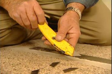 cutting carpet