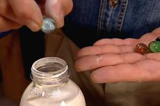 putting paint in water bottle