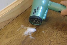 using a hair dryer to melt wax