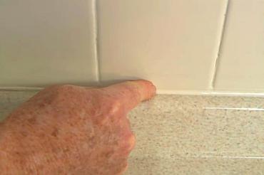 applying caulk
