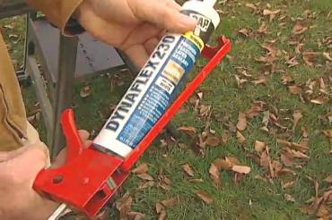 loading the caulk into a caulking gun