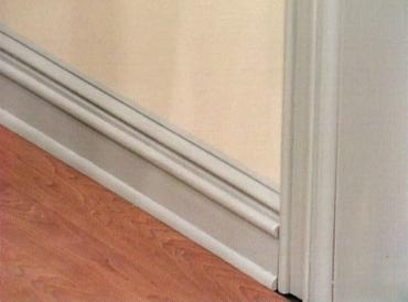 Baseboard and door casing molding with detail added