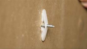 https://housecallsdiy.com/uploads/projects/The-backside-of-a-wall-board-with-a-toggle-wall-anchor_WEB.jpg